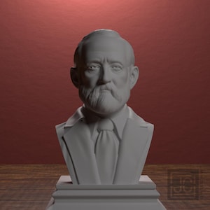 May include: A white bust of a man with a full beard, mustache, and a suit with a tie. The bust is on a rectangular base, set against a red background and a wooden surface.