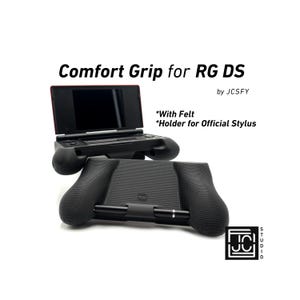 May include: A black comfort grip for the RG DS, with the text "Comfort Grip for RG DS" and "by JCSFY". The grip has a textured surface and a holder for the official stylus. The image also shows a RG DS console.