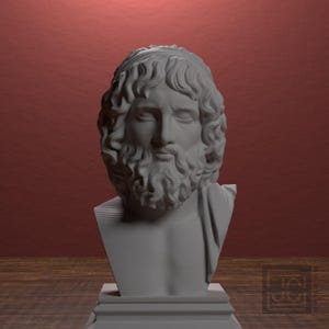 Puede incluir: Busto blanco de un hombre barbudo con cabello rizado y una prenda drapeada. La escultura tiene un estilo clásico y está sobre un fondo rojo y una superficie de madera.