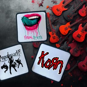 May include: Three square patches with band logos: Falling in Reverse, Papa Roach, and Korn. The background features several electric guitars in shades of red, orange, and gray.