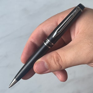 Penna a sfera vintage di lusso Waterman France con pennino fine in metallo nero.
