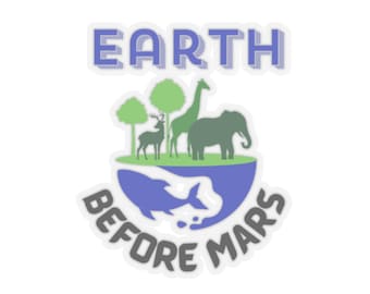 May include: A sticker featuring a blue whale holding a green island with a giraffe, elephant, deer, and trees. The text "EARTH BEFORE MARS" is written in a circle around the whale.