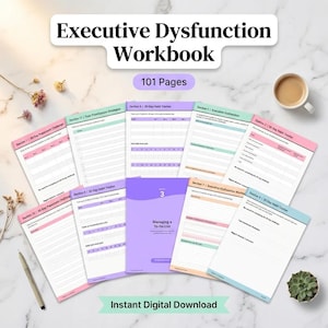 May include: A white ceramic mug with a black handle and the text "But First, Coffee" in a bold, black font. The mug is set against a blurred background. The mug appears to be approximately 10 cm tall.