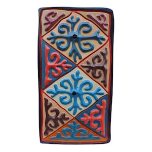 Decoración de pared en relieve con motivos africanos