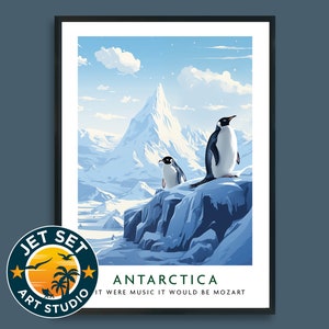 May include: A vintage travel poster design featuring a snowy mountain range with two penguins standing on a rocky outcrop. The poster has a blue, white, and green color scheme and the text "ANTARCTICA" and "IF IT WERE MUSIC IT WOULD BE MOZART".