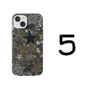 May include: A phone case with a pattern of stars in various sizes and colors, including black, white, and gold. The case has a clear border and a camera cutout. The number 5 is visible in black on the right side.