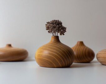 Elegant small vases made of wood.