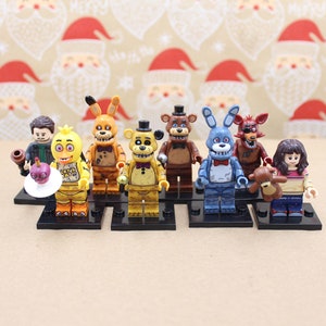 Here are some more FNaF Lego Figures I've made/painted, I still am