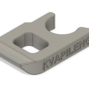 Puede incluir: Un soporte de tubería de plástico gris con el texto "KVAPILENG" impreso en el lateral.