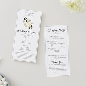 May include: Two rectangular white wedding program cards with black text and a gold monogram. The left card displays Sarah Jane Doe and John Paul Smith, Wedding Program, and Order of Ceremony. The right card lists the Wedding Party and Thank You.