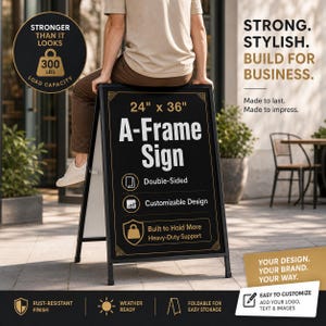 May include: A black metal A-frame sign measuring 24 inches by 36 inches with a 300 lbs load capacity. The sign features text including A-Frame Sign, Double-Sided, Customizable Design, Built to Hold More, and Heavy-Duty Support with a rust-resistant finish.