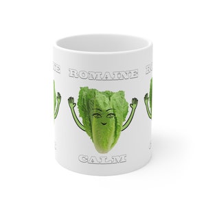 May include: White ceramic mug with a green romaine lettuce cartoon character with a smiling face and the text "Romaine Calm" on the front.