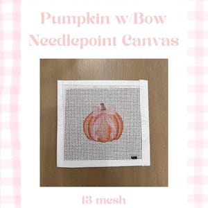May include: A square needlepoint canvas featuring a printed orange pumpkin with a bow design. The text "Pumpkin w/Bow Needlepoint Canvas" and "13 mesh printed" is displayed. The canvas has a white grid pattern and a small black mark in the corner.