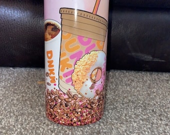 May include: A pink and orange stainless steel tumbler with a donut and coffee design. The tumbler features a pink donut with sprinkles, a coffee cup with the Dunkin' Donuts logo, and coffee beans.