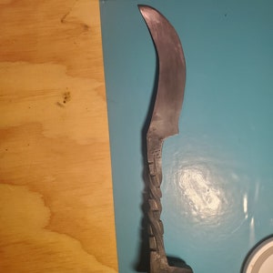 Curved railroad spike knife