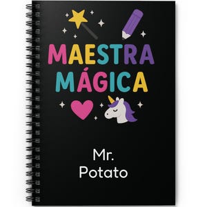 May include: Black spiral notebook with a colorful unicorn, stars, and a pencil. The text "MAESTRA MÁGICA" is in rainbow colors. The name "Mr. Potato" is at the bottom.