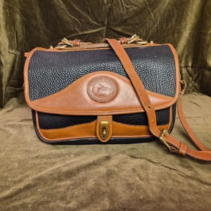 Sac à bandoulière Dooney & Bourke vintage noir et marron clair