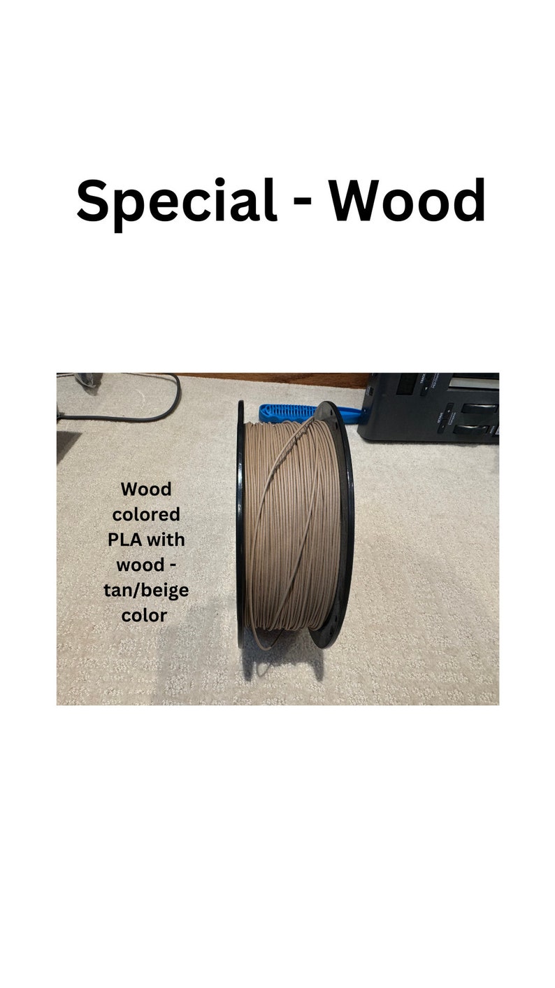 May include: A spool of wood-colored PLA filament for 3D printing. The filament is a tan/beige color.