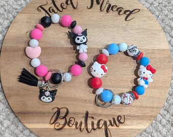 Pulseiras com chaveiro da Kitty & Friends