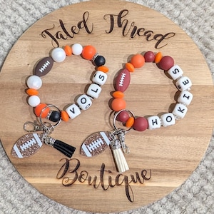 Bransoletki z brelokami piłkarskimi