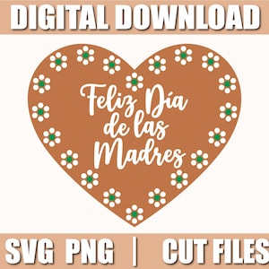 Puede incluir: Un diseño en forma de corazón marrón con el texto "Feliz Día de las Madres" en escritura blanca. El corazón está delineado con pequeñas flores blancas con centros verdes. También están presentes las palabras "DIGITAL DOWNLOAD" y "SVG PNG | CUT FILES".