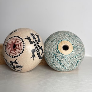2 Native American Mata Ortiz signed clay seed pots signed Ramirez Lizard