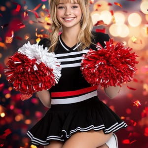 May include: A young woman in a black and white cheerleading uniform with red accents holds two red and white pom-poms. She is smiling and kneeling with a red and gold confetti background.