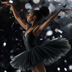 May include: A black ballerina in a black tutu with a black background. Confetti falls around her as she dances.