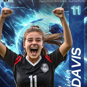 May include: A young person in a black soccer jersey with the number 11, arms raised in celebration. The jersey has red accents and a white collar. The background features a soccer ball and text that reads "2025 Lakeside Lions" and "Olivia Davis".