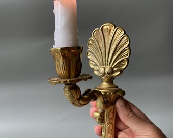 Vintage brass wall sconce, wall candlestick. Ornate floral motif taper candle holder. Home decor, wall display.