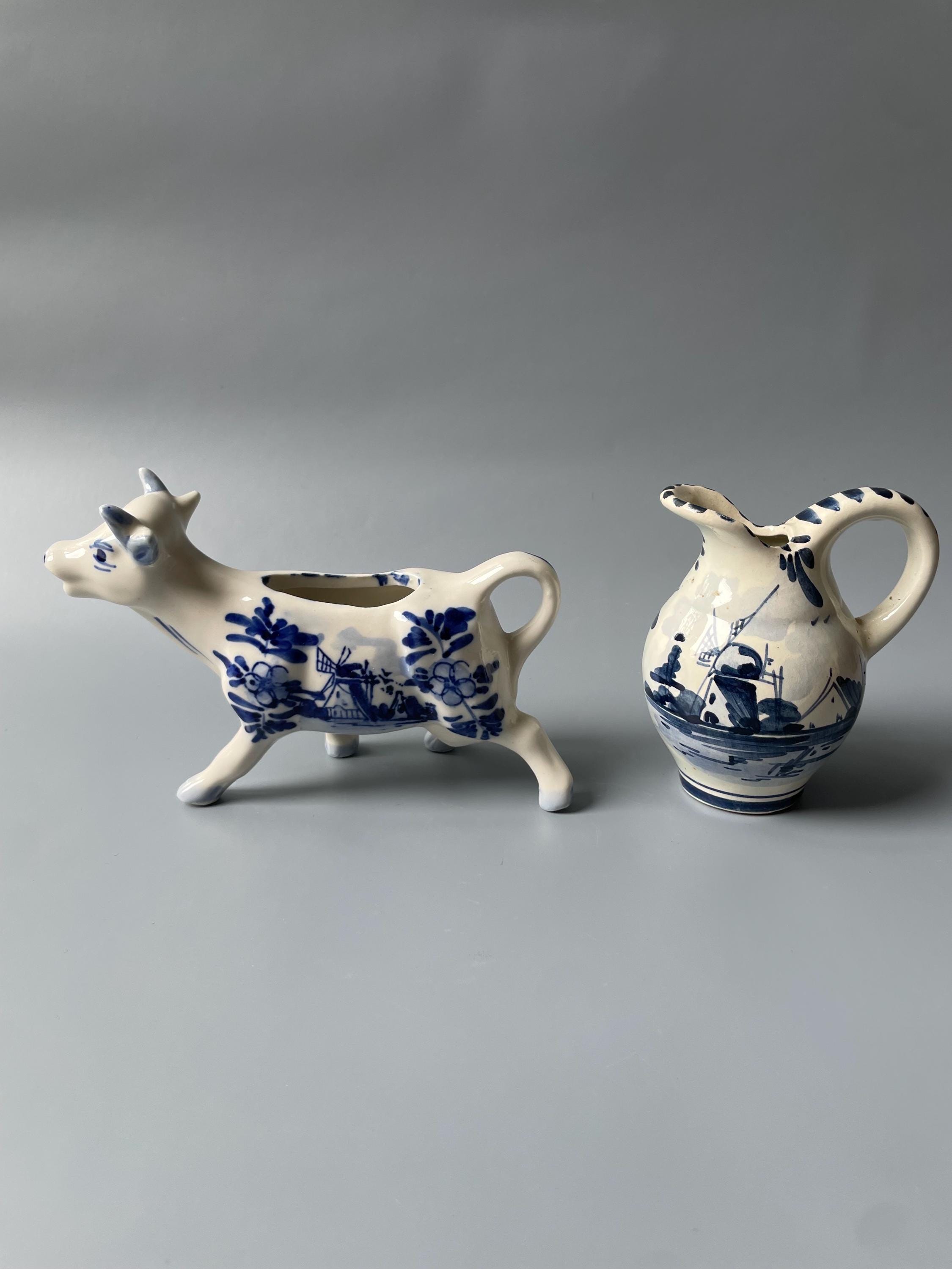 Set of 2 vintage Delft style hand painted creamers / cow shape / jugs / blue & white floral motif / display decor / made in The Netherlands
