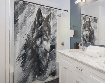 May include: A black and white shower curtain featuring a detailed illustration of a wolf's head. The wolf is depicted in profile, with a focus on its piercing gaze and textured fur. The background has abstract brushstroke effects.