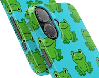 May include: A bright blue smartphone case featuring a repeating pattern of cartoon green frogs with black eyes and smiling mouths. The case has cutouts for the camera lenses and side buttons, showing a glossy finish and a durable plastic construction.