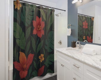 May include: A shower curtain featuring a dark background with a botanical design. Large red and orange flowers are interspersed with green leaves. The curtain is hanging in a bathroom with white cabinets and a marble countertop.