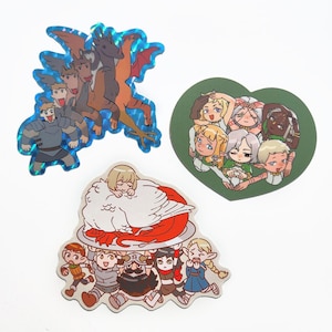 May include: Set of three stickers featuring cartoon characters. The first sticker is a holographic blue sticker with a dragon and several people riding on it. The second sticker is a green heart-shaped sticker with several people holding hands. The third sticker is a white sticker with a group of people carrying a large white bird on a red plate.
