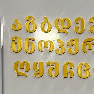 Ímãs de letras georgianas