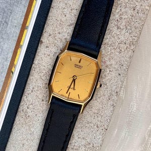 SEIKO Exceline クォーツ ゴールド SEIKO Exceline Quartz Diamond Gold Oval Case White Shell
