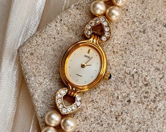 Avon 1990 Womens MoP Quartz Watch Gold Tone Faux Pearl Bracelet Avon Pearl Watch (ULTRA RARE!!) DETAILS: - silver sunburst  main image 4