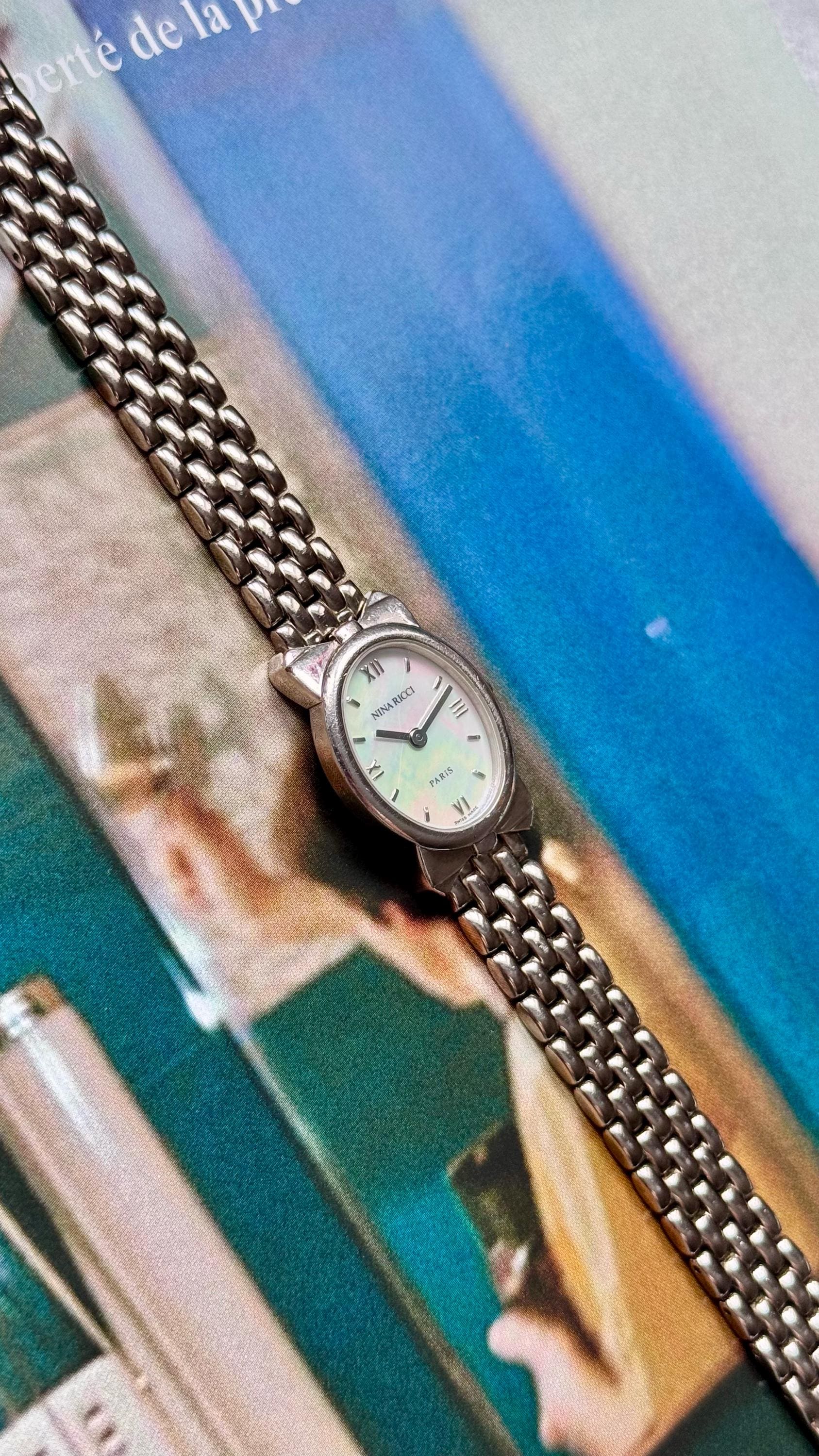 Nina Ricci Gold and Silver Crystal Accent Mother-of-Pearl Dial Watch VINTAGE NINA RICCI MOTHER-OF-PEARL TWO-TONED WATCH – Panahon  main image 3