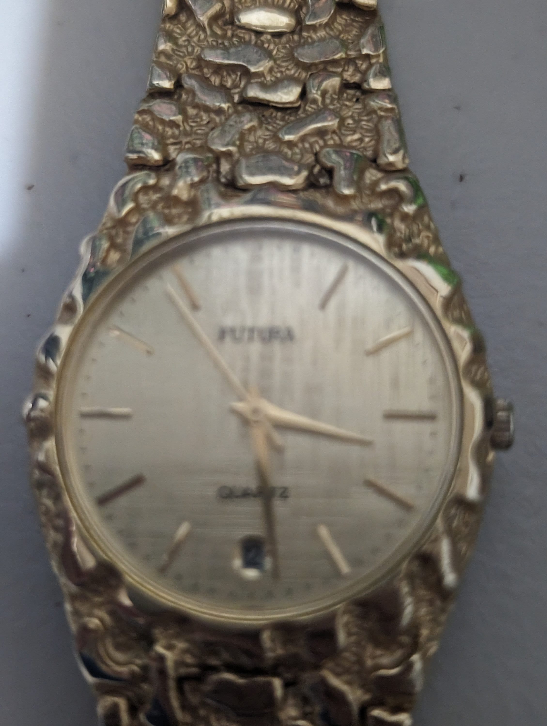 Futura Gold Nugget quartz watch with new battery. In excellent condition. Keeps good time. Free shipping