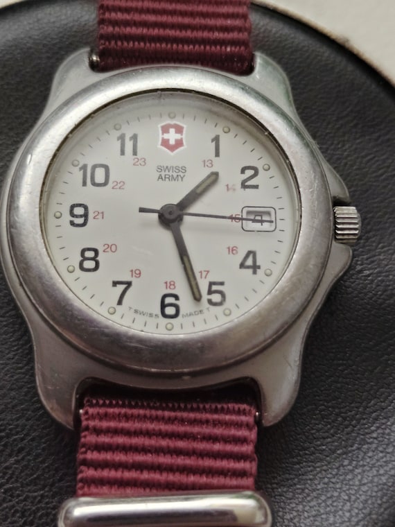 Vintage Ladies Swiss Army Watch With New Battery and New NATO Band. Watch is in Very Good Condition and Keeps Excellent Time. Ships Free. Etsy