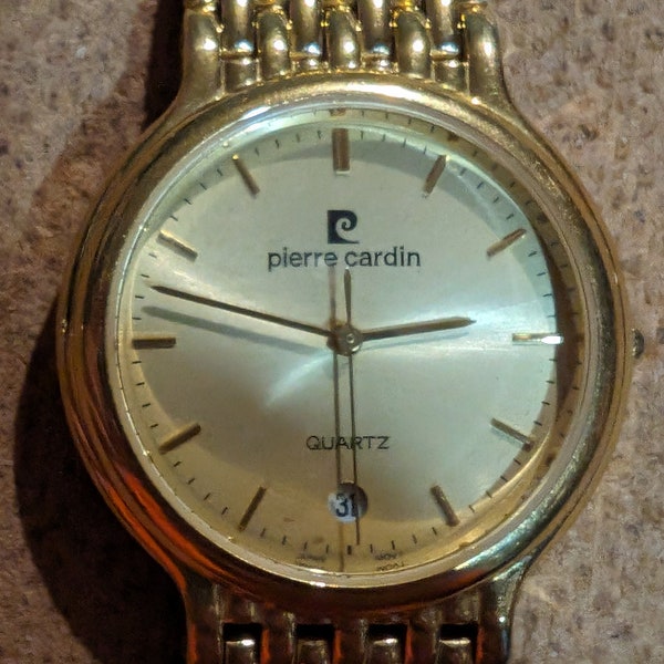 Pierre Cardin quartz date watch Great condition has a new battery and keeps good time.