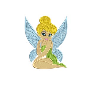 May include: An embroidery design of a fairy with blonde hair in a bun, blue eyes, and light blue wings, wearing a green dress. The text 4 sizes and 3, 4, 5, 6 inches is displayed in green and red font above and below the character illustration.