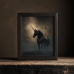 May include: A framed painting depicting a black unicorn standing in a misty field. The unicorn has a long, spiralled horn and is illuminated by a soft light.