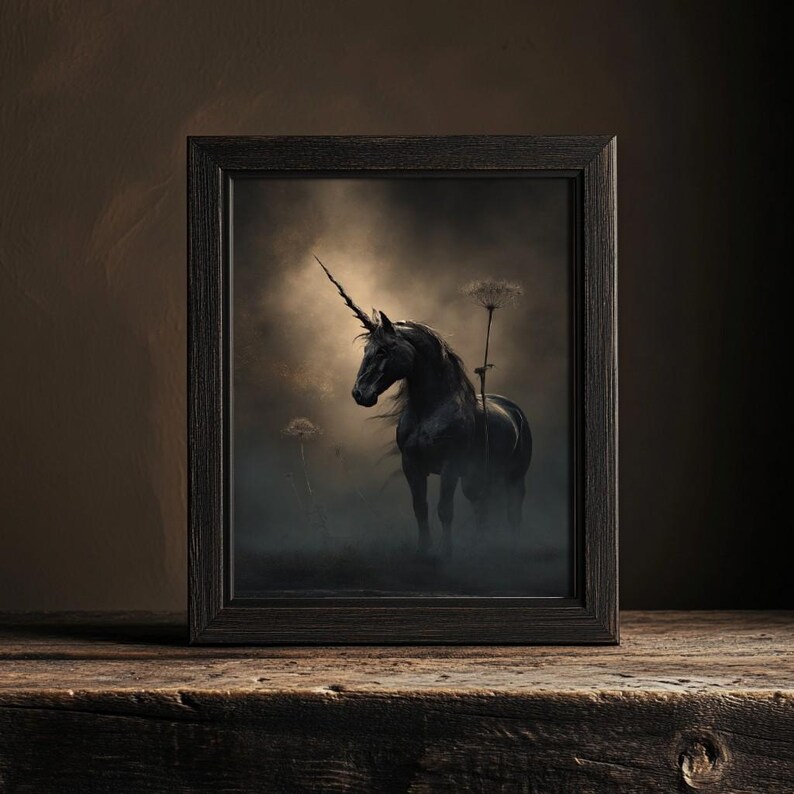 May include: A framed painting depicting a black unicorn standing in a misty field. The unicorn has a long, spiralled horn and is illuminated by a soft light.