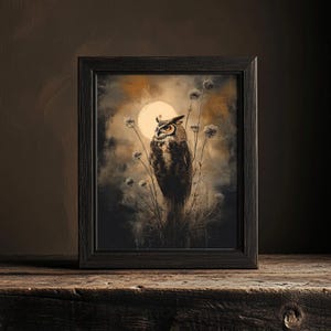 May include: A framed print of a brown and white owl perched on a branch with a full moon in the background. The owl is looking to the left and the moon is a pale yellow color. The background is a dark brown and the branches are a light brown.