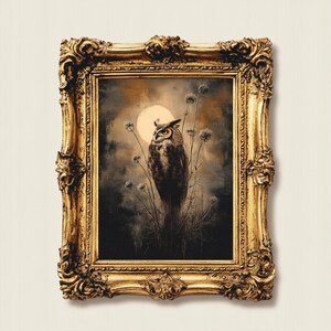 May include: A framed painting of an owl perched on a branch in a moonlit forest. The owl is brown and gray with yellow eyes. The painting is set in a gold frame.