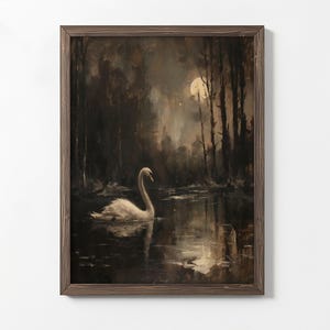 May include: A framed painting of a white swan swimming in a dark, moonlit lake. The swan is in the foreground, with trees and a full moon in the background.