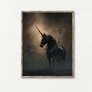 May include: A black unicorn with a long horn stands in a misty field with tall, dried flowers. The unicorn is silhouetted against a dark background.