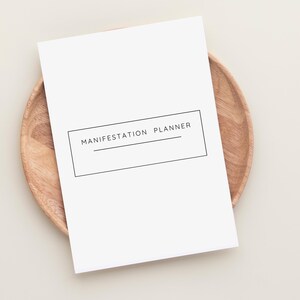 Unlock the power of your dreams with this Manifestation Planner Printable. This comprehensive Manifestation Journal is designed to help you manifest your goals, dreams, and desires using the Law of Attraction.